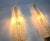 Pair of crystal 'feather' wall lamps by André Arbus & Veronese, hand made with brass glass holders. The glass work is...