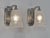 Hettier & Vincent A wonderful pair of 1925-1935 French art deco wall sconces in nickel plated bronze and clear frosted...