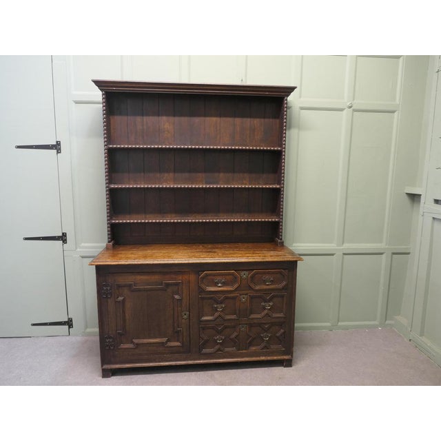 Oak Country Dresser Decorated with Geometric Mouldings This is a lovely early Victorian piece it is constructed in solid...