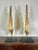 Pair of 19th century Italian Baroque style 22K giltwood wings. The wings have been mounted on iron bases. Wear is...
