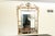 Monumental Friedman Brothers Louis XVI Giltwood Beveled Mirror – Urn & Garland Crest Elevate your home with the pinnacle...