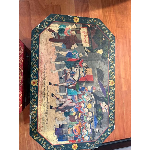 Beautiful pair of antique hand-painted Asian chests, Southeast Asian - Thailand, featuring richly detailed traditional...