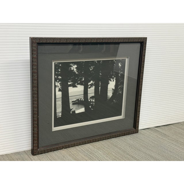 Design Plus Gallery presents a Photograph of a Boat at the Dock in Lake Tahoe. The imagery is captured in ever dramatic...