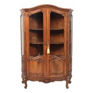 Early 20th Century Louis XV Carved Walnut Stained Vitrine Armoire For Sale