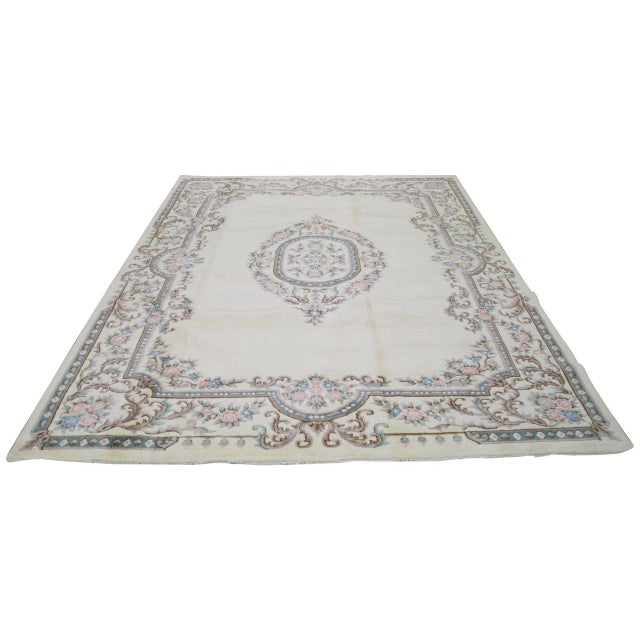 Hand-knotted with care using traditional rug-making techniques, this wool rug blends timeless craftsmanship with a modern...