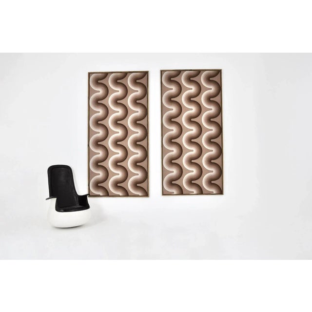 Pair of paintings with fabric by Verner Panton in a wooden frame. Signed Verner Panton. Wear due to time and age of the...