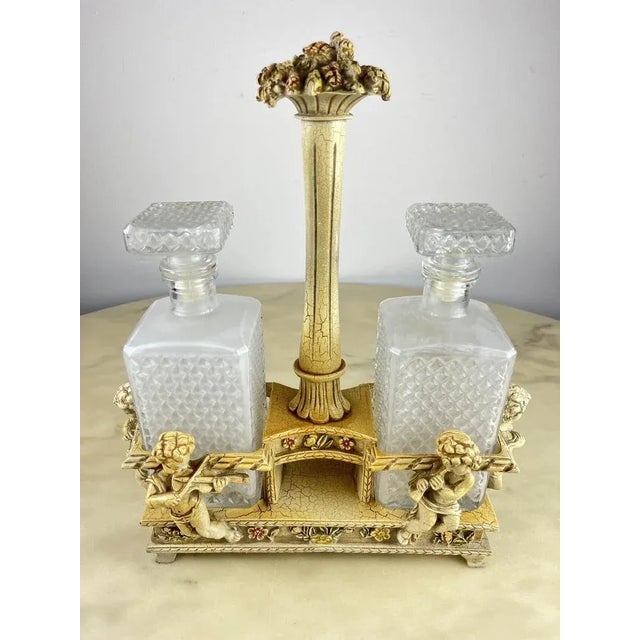 Table set for oil/vinegar bottles, Italy, 1960s The bottle holder is ivorine. Ivorine has also been used as a low-cost...