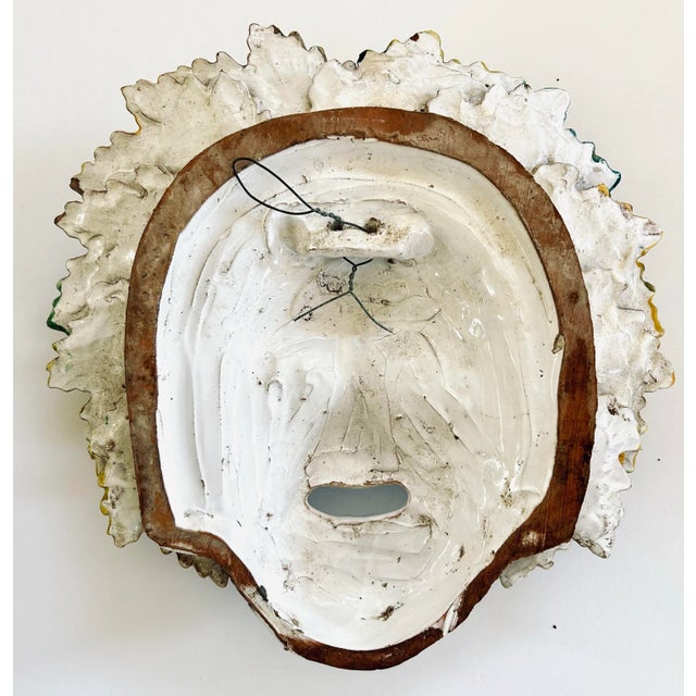 Handmade large Italian Dottura pottery wall mask of Bacchus. Typically you find him decorated with a crown of grapes. This...