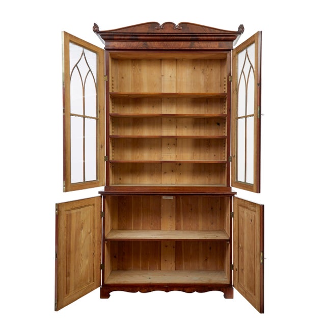 Fine example of a regency period bookcase circa 1820. Very much in the manor of thomas hope. Matching flame mahogany...
