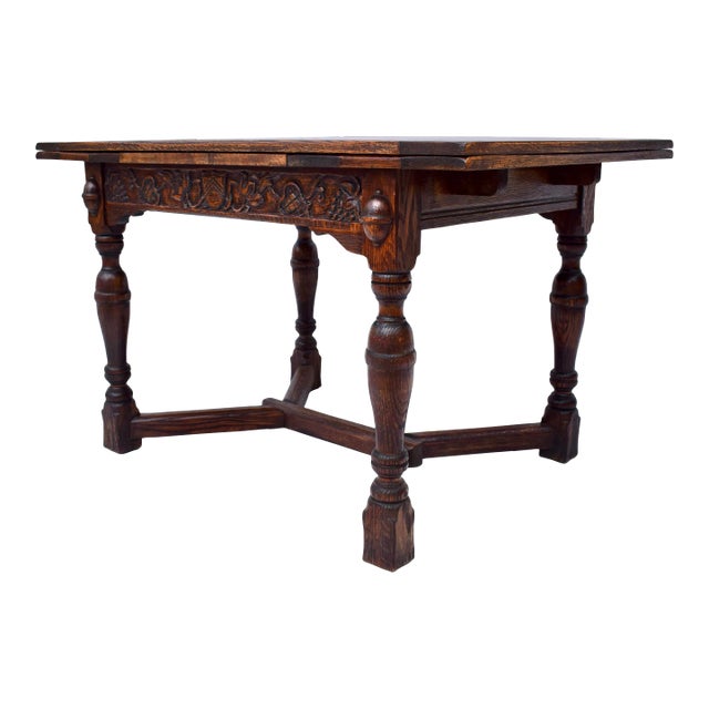 Antique Jamestown Lounge Company Feudal Oak refectory dining table. Made of oak featuring Jacobean styling with ornate...