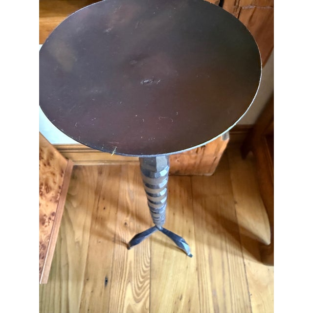 Brutalist style hand forged iron candle holder in a primitive style. Piece is handmade and not perfectly symmetrical.