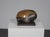 A refined abstract bronze sculpture by Dutch artist Jos van Vreeswijk. The work combines a rounded, almost organic upper...