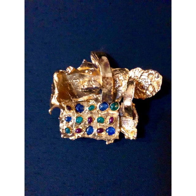 Measures about 4 X 3.75 inches. Box frame is 17 X 13 inches. Signed by artist verso. From the literature that I have seen...