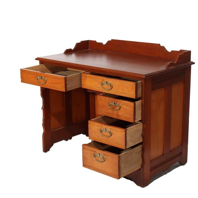 Antique Cherry Five Drawer Single Pedestal Desk C1910 Measures - 34.5"H x 40.25"W x 23.25"D This antique desk, crafted...