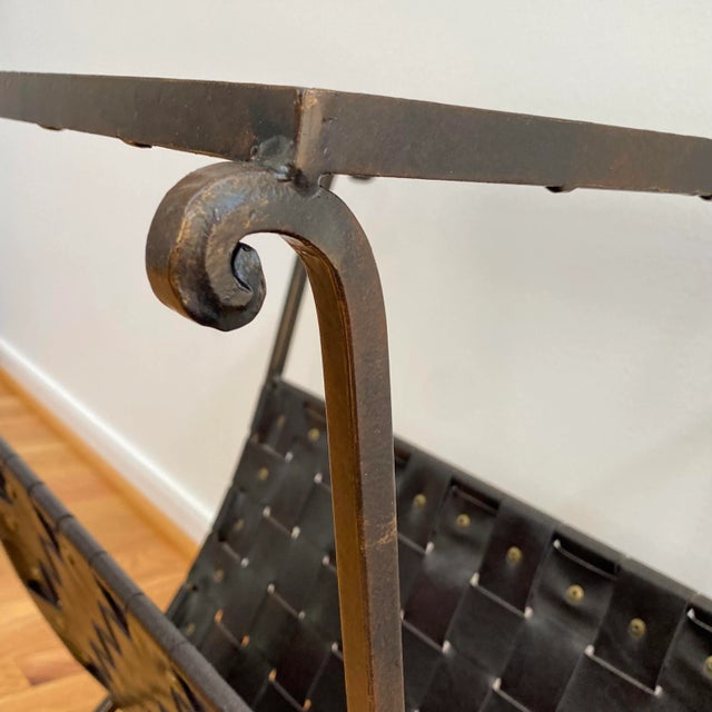 One part funk, one part classic. That’s the tag line for this beautiful 1990s leather, metal and glass magazine rack side...