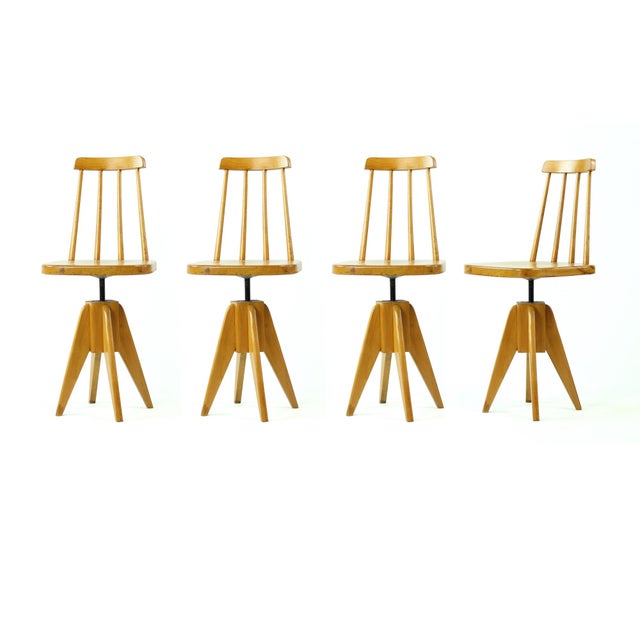 Mid-century piano stool produced in Czechoslovakia in the 1960s, featuring a rare integrated backrest. Crafted from solid...