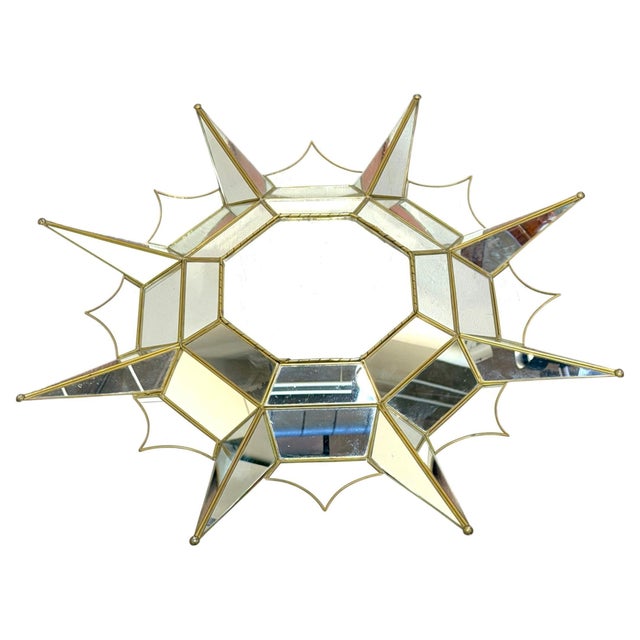 Mexican Modern Gilt Metal Sunburst Mirror in the Style of Sergio Bustamante, 1979 A striking Mexican Modern sunburst...