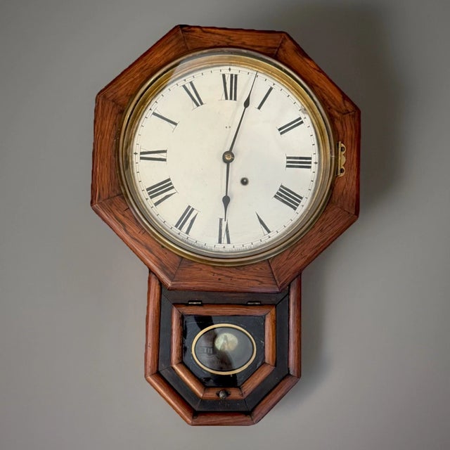 This listing is for a nice antique American wall clock. This clock is by Seth Thomas. It has a nice schoolhouse style...