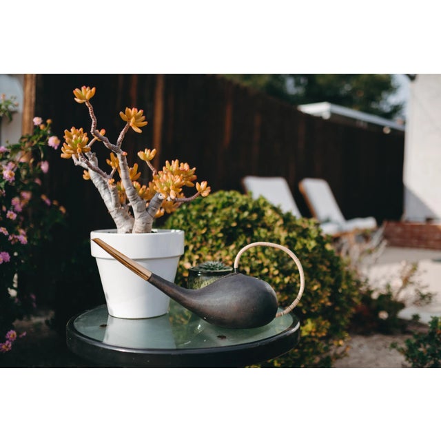 Carl Auböck #3632 watering can in patinated brass and cane. Designed in the 1940s, this incredibly clean and refined...