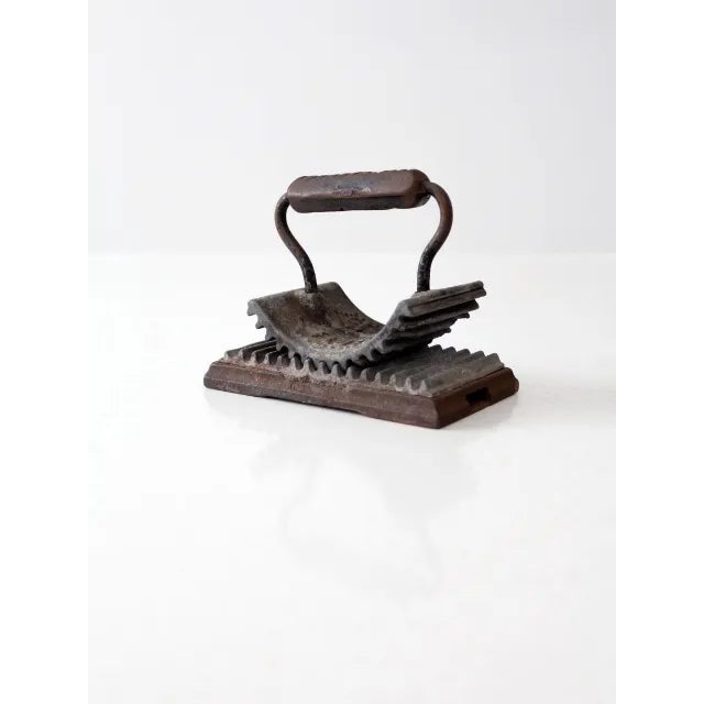 Antique Geneva hand fluter, a classic tool once used to press crisp fluted ruffles into cuffs, collars, and decorative...