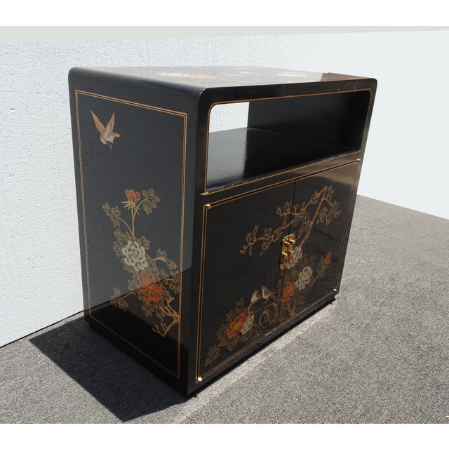 Gorgeous Asian Cabinet in Good Vintage Condition. Solid and Firm. wear is usual for its age. Please study the photos and...