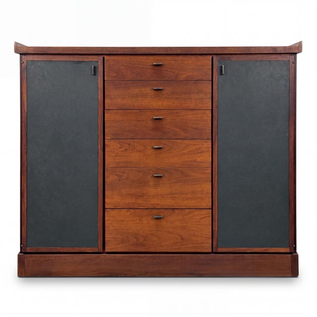 This is a mid-century modern Jack Cartwright for Founders walnut pagoda form dry bar cabinet or gentleman’s chest. Jack...