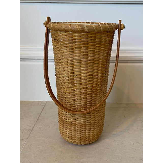 Terrific 1970’s vintage woven wicker & rattan wine cooler/carrier, with removable plastic liner. Beautiful wooden handle....