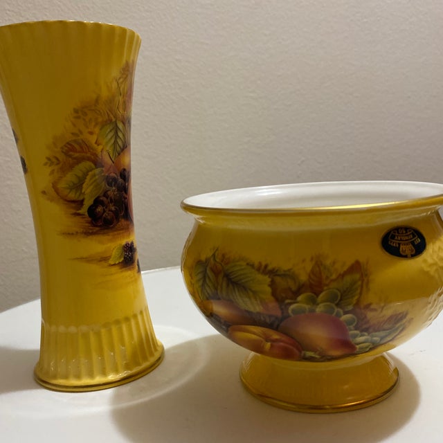 This collection is renowned for its intricate hand-painted designs of fruits such as peaches, plums and grapes in rich...