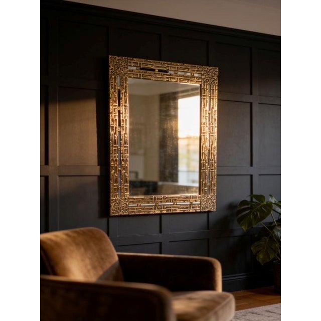 Mirror from the Desirèe series with a chiseled cast bronze frame. Made by Frigerio of Desio, Italy, circa 1970. Size: 65 x...