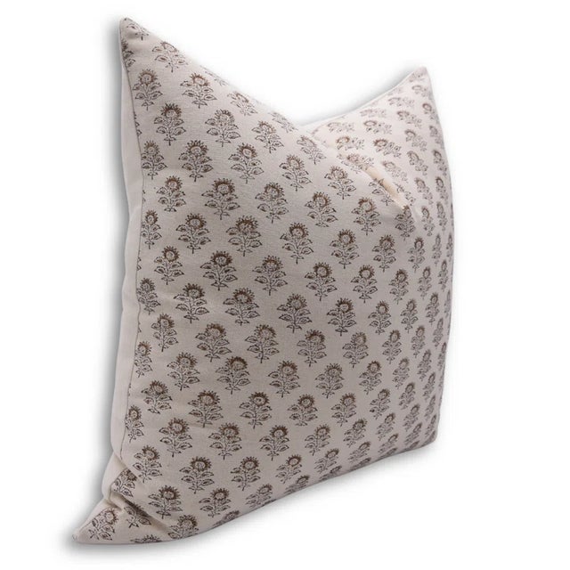 The Bagru Buti cushion cover showcases a timeless hand block printed motif rooted in the traditional craft of Bagru...