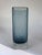 This elegant Scandinavian retro vase in a stylish columnar shape was made by the Swedish Glimma glassworks in Glimåkra,...