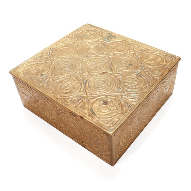 A fine antique Tiffany Studios box. In gilt Bronze. In the Zodiac pattern. Model no. 1655. This table box is often...