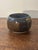 Attractive mid century modern studio ceramic bowl. Combination of blues and brown glaze create a beautiful dark shadowy...