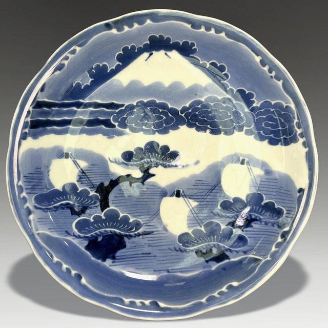 A fine 18th-century Japanese Arita porcelain dish decorated in traditional cobalt blue. Dating to circa 1730–1760, the...