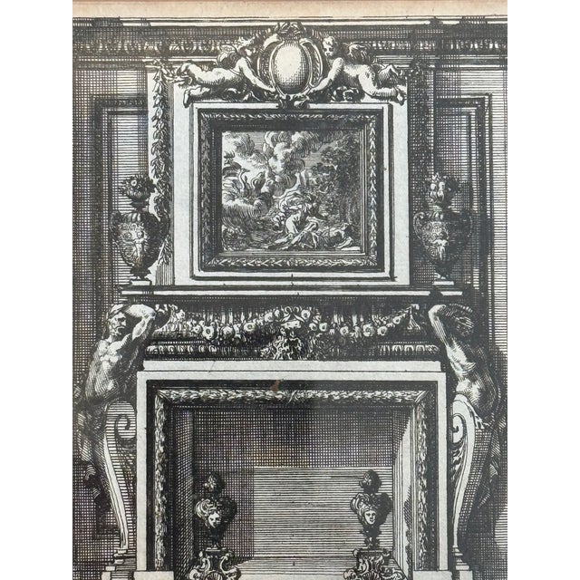 An elegant 18th-century French architectural engraving depicting a richly ornamented classical interior centered around an...
