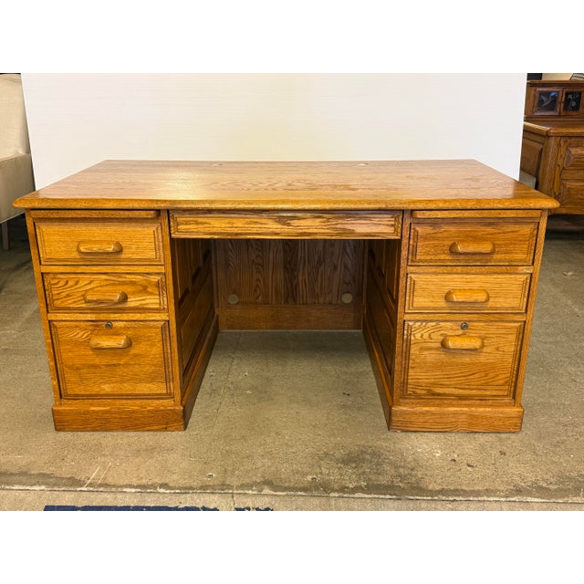 Design Plus Gallery presents a Smith Oak Executive Desk from Noriega Furniture. This Smith model FT2060 desk has an oak...