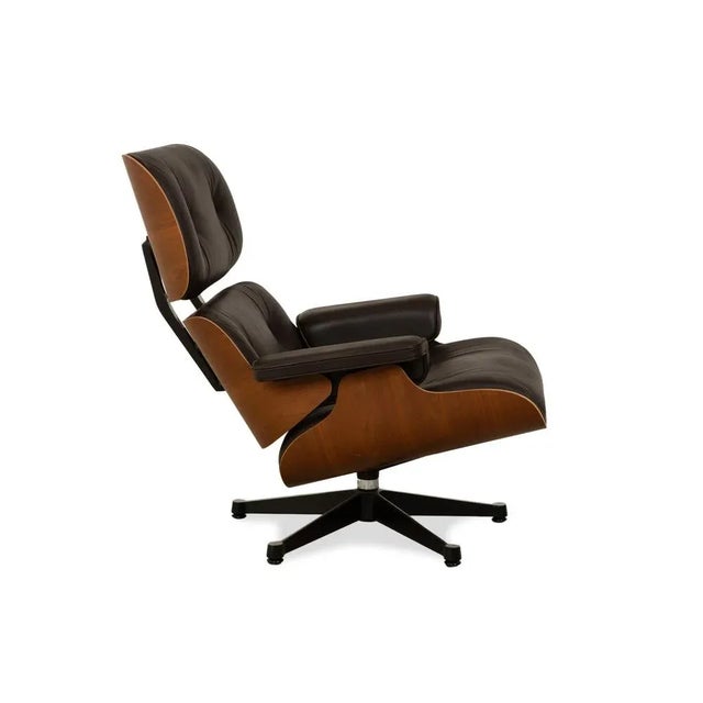 Set of Lounge Chair and Ottoman in Dark Brown Leather by Charles & Ray Eames for Vitra For Sale - Image 16 of 18