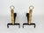 Pair of andirons made of superimposed brass elements in a bamboo style, ending in rings, wrought iron base. Created by...