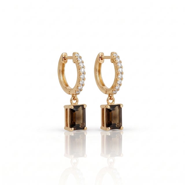 Elevate your daily ensemble with these breathtaking drop huggie hoop earrings featuring a sparkling pavé-set hoop and a...