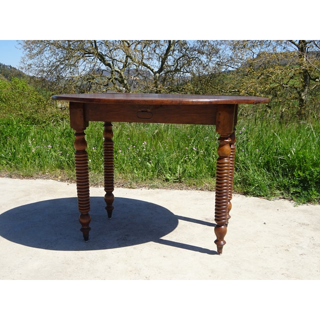 Small dining table for 2 to 4 people or console table. Almost round 90x98cm solid walnut top, 2cm thick. Leaf drops on...
