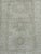 Stone-washed Khotan rug, hand-knotted in Afghanistan from 100% wool. Measuring 1’11” x 3’, the rug features a softly faded...