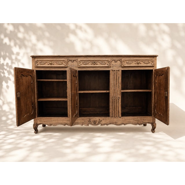 A very fine antique solid oak sideboard, dating from the late 18th century, boasting beautiful architecture and rich...
