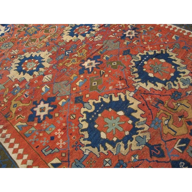 Masterly Handmade Red Background With Brown Border Medallion-Crest Design Antique Persian Rug For Sale In New York - Image 6 of 8
