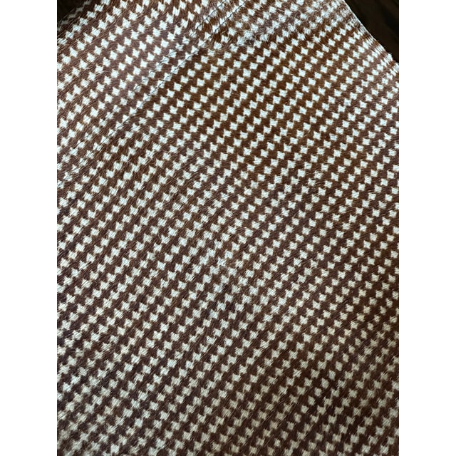 A bold reinterpretation of the iconic Cesca chair by Marcel Breuer, this piece blends Bauhaus minimalism with high-fashion...