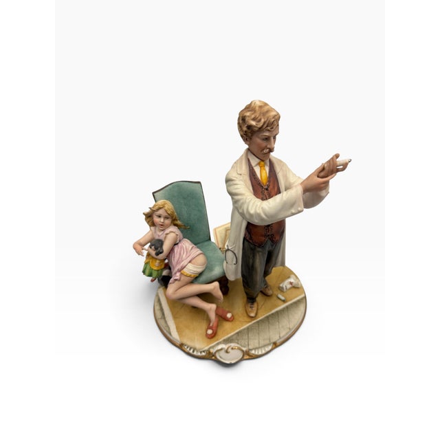 Expand your collection of fine mid-century medical satires with this highly sought-after, authentic Capodimonte porcelain...