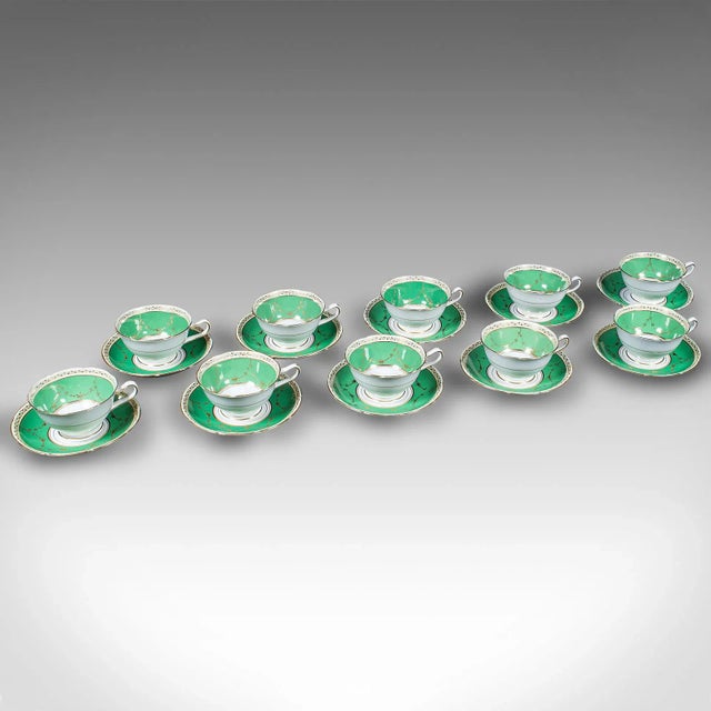 This is a vintage 10 person tea set. An English, ceramic afternoon tea service, dating to the early 20th century, circa...