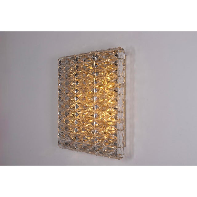 Kinkeldey faceted crystal ceiling light, large format with a shallow depth, 1970s. Composed of 48 cut crystal elements...