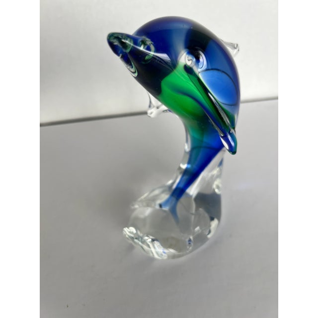 This beautiful Mouth-Blown Glass Dolphin would be perfect for a Paperweight or bookcase accessory—acquired from a Palm...
