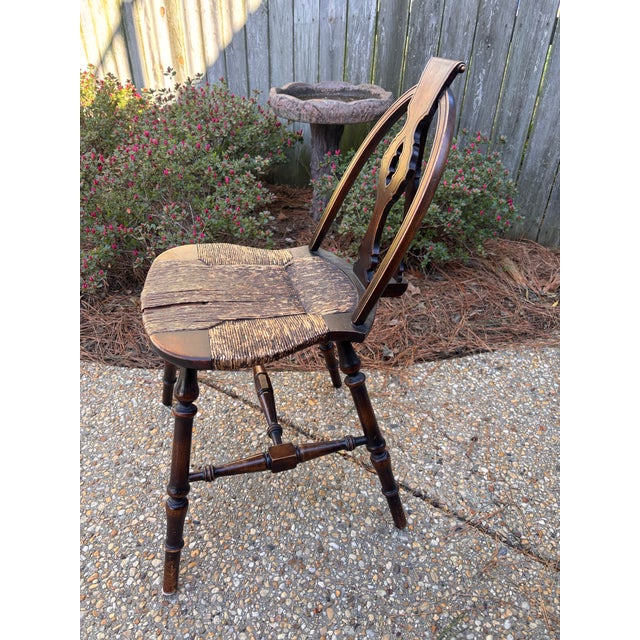 Charming and petite-scaled 19th-century Windsor chair, showcasing timeless craftsmanship and classic early American...