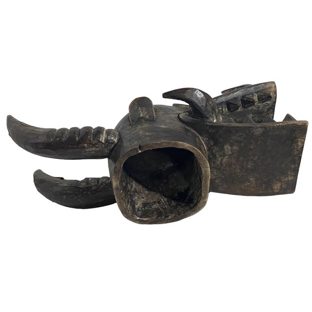 Fabulous Senufo Wanyugo Fire Spitter helmet/Mask from the people in the Cote d'Ivoire. 11" h by 25" d by 12.5" w This mask...